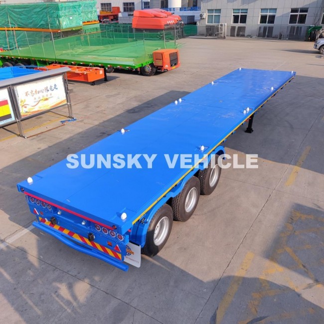 Cần bán rơ moóc sàn phẳng trọng lượng nhẹ 6,5 tấn cho thị trường Tanzania.